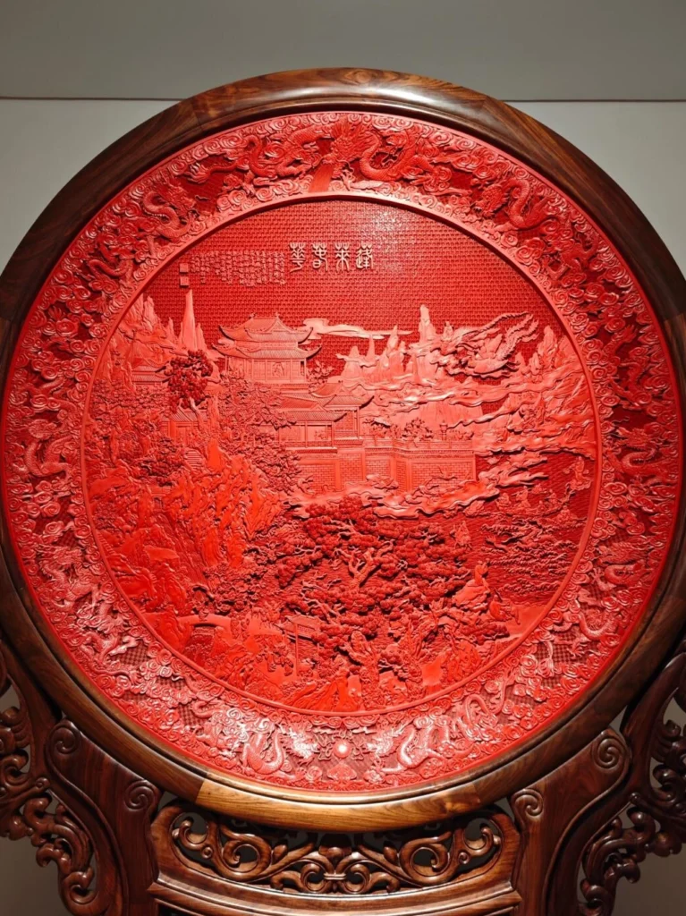 Traditional Chinese lacquerware art display with decorative craftsmanship and cultural patterns